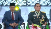 Jokowi (kiri) bersama Prabowo (kanan) saat menghadiri Rapim TNI Polri. (Dok. Kemhan).